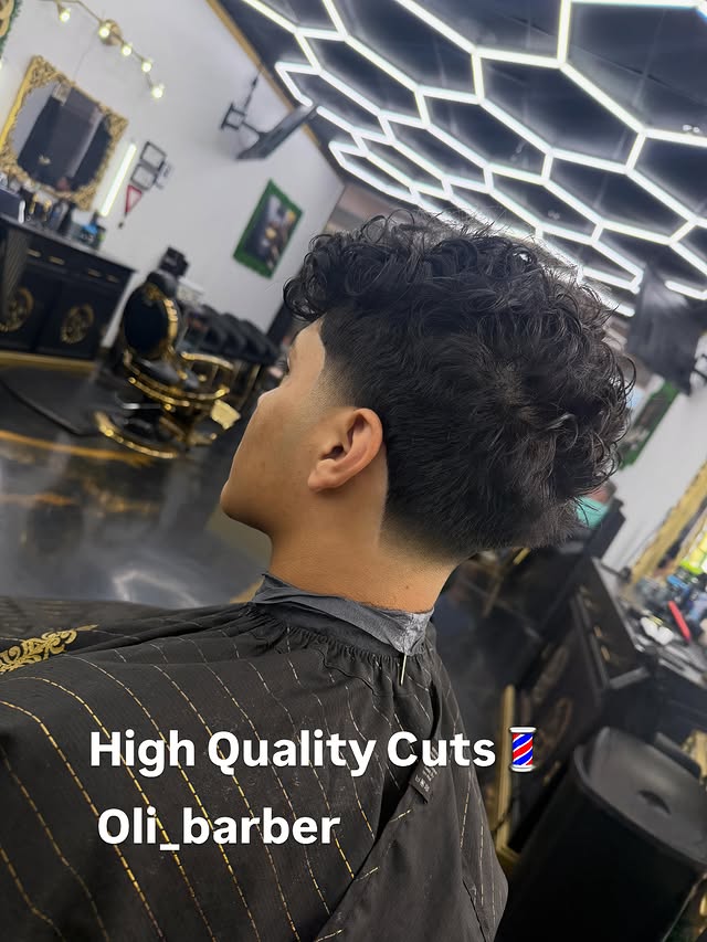 Curly taper fade by Oli