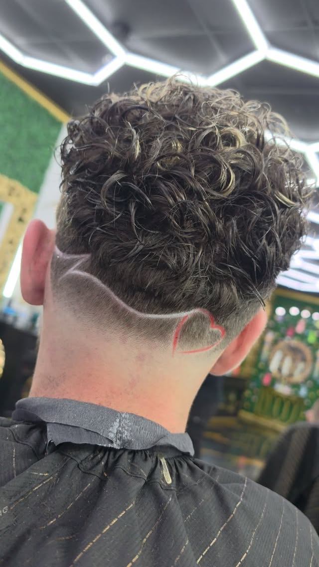 Curly cut with heart design at the nape